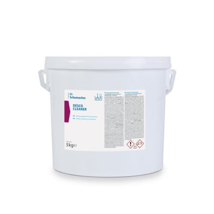 A white plastic container with two handles, labeled "Dr. Schumacher DESCO CLEANER" from Dr. Schumacher GmbH, is a surface cleaner that contains instructions, warnings, and hazard symbols on the front label and promises streak-free results.