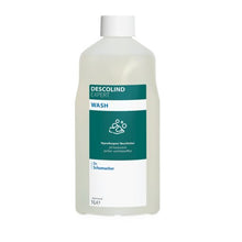A 1-liter plastic bottle of Dr. Schumacher GmbH DESCOLIND EXPERT WASH, a hypoallergenic skin cleansing solution, with a white cap and green-white label.