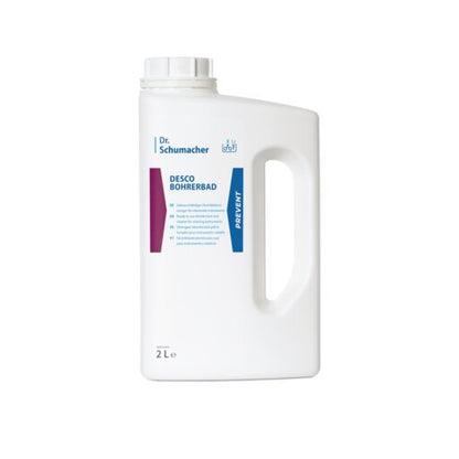 A white 2-liter plastic bottle with screw cap and handle with the inscription "Dr. Schumacher DESCO BOHRERBAD" from Dr. Schumacher GmbH for cleaning and disinfecting dental instruments is provided with blue and maroon accents on a plain background.