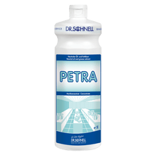 A white 1-liter plastic bottle labeled "Dr. Schnell PETRA oil and grease remover for surfaces" from DR.SCHNELL GmbH & Co. KGaA, with blue lettering and graphics, contains a highly concentrated surface cleaner and oil/grease remover for powerful cleaning.