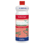 The white plastic bottle with a red cap and the inscription "Dr. Schnell MULTICID sanitary cleaner" in green and red lettering from DR.SCHNELL GmbH & Co. KGaA, is ideal as an effective sanitary cleaner for thorough bathroom cleaning.