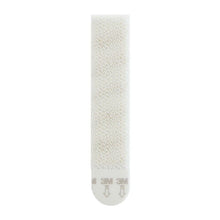 A large white Command™ Picture Hanging Strip L from 3M Deutschland GmbH, with a textured surface and rounded tab ("3M" logo & arrows), ideal for hanging pictures without nails or drilling; value pack with 6 sets (17206-6).
