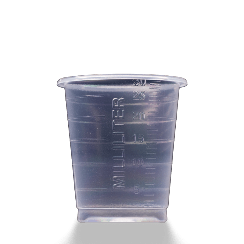 A MED COMFORT ECO disposable medical cup 30 ml graduated by AMPri Handelsgesellschaft mbH, with 5-30 mL milliliter markings, stands on a simple light surface.