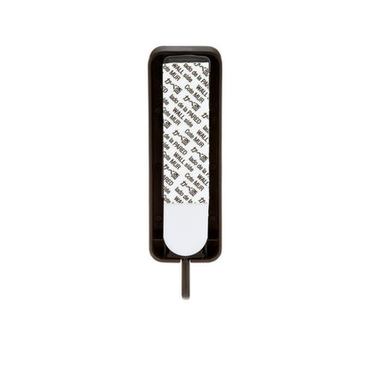 The medium-sized Command™ matte black hook, 17034B from 3M Deutschland GmbH is rectangular, matte black, and shown on a white background with partially visible adhesive strip as a removable wall hook without drilling.