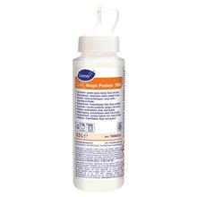 A 500 ml dosing bottle of Diversey Clax Magic Protein Stain Remover for blood, protein, food, and grass with a spout closure and multilingual label from Diversey Deutschland GmbH & Co. OHG.