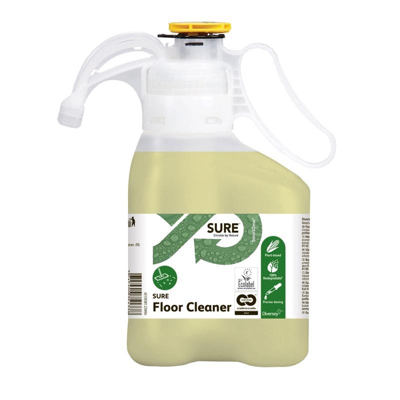 A plastic bottle with SURE Floor Cleaner, floor cleaner from Diversey Deutschland GmbH & Co. OHG, partially filled with light yellow liquid, is equipped with a white-green label that highlights the plant-based, biodegradable formula and the eco-certification.