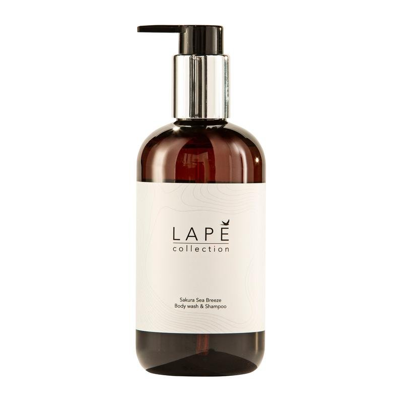A brown plastic pump bottle labeled "LAPE Earth Collection Sakura Sea Breeze Body Wash & Shampoo" from Diversey Germany (300 ml) offers an eco-certified shower gel & shampoo with cherry blossom scent and sea breeze in one.