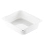 A white rectangular CPET tray 1/2 GN White CPET 325x265 from Duni GmbH, with slightly rounded corners and a smooth surface, shown at an angle with an interior view and one side.