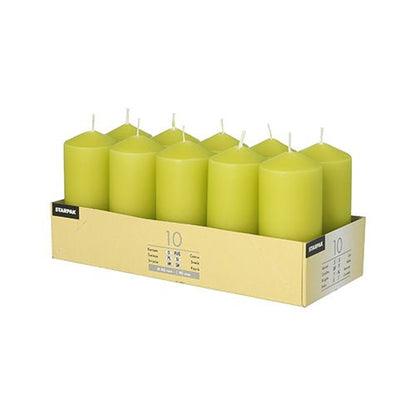 A cardboard tray labeled "Starpak 10 pillar candles Ø 40 mm · 90 mm" contains ten yellow-green candles in two rows of five each. Each candle has a visible wick, offers a long burning time, and creates a romantic atmosphere. Brand: Starpak.