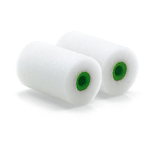 Two Nölle Profi Brush Mini Paint Rollers Fine 5.5 cm / Ø 35 mm by Nölle Profi Brush Bürsten- & Pinseltechnik e.K. with green plastic cores stand side by side on a white surface - perfect for professional painting on smooth surfaces.