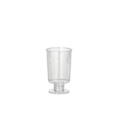 The Starpak 20 white wine stemmed glasses, made of crystal-clear polystyrene, stand out for their elegant design, reminiscent of classic white wine glasses. The glass rests on a wide base with a short stem against a neutral white background.