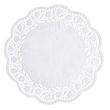 The PAPSTAR 100 round, white doilies from PAPSTAR GmbH is a round white doily with a solid core and a filigree, lace-like wavy edge with floral and geometric patterns made from FSC-certified material.