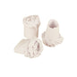 Three white PAPSTAR Poultry sleeves (1.8 cm) from the PAPSTAR "GmbH" is printed on a white background—two upright, one on its side with scalloped edges. Ideal for festive meals; the folding box contains 100 pieces.