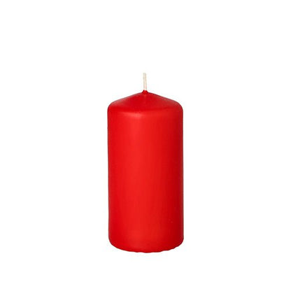 A single, unlit Starpak pillar candle with extra long burning time (Ø 50 mm, height 100 mm) and visible wick stands upright against a white background.