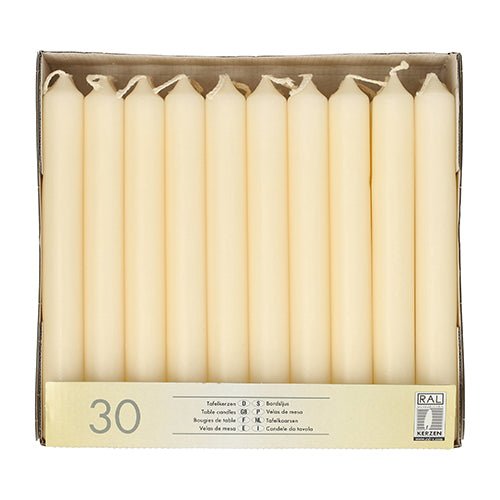 The Starpak box contains 30 cream-colored table candles (Ø 2.1 cm · 19.6 cm) in two rows, labeled with product information and test marks – ideal for an elegant table decoration.