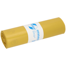 A roll of yellow DEISS trash bags 575x1000x0.06 mm made of recycled LDPE 70 l from EMIL DEISS KG (GmbH + Co.) is tightly packed with a white-blue label containing product information and branding.