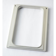 The Duni GmbH cassette DF10/20 is a rectangular, light gray frame with rounded inner corners and four screw holes, perfect for organizing PP trays 265x162x50 or 265x162x70 mm as a practical storage solution. The package contains 1 piece.