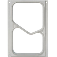 The DF10/20 cassette from Duni GmbH is a rectangular silver metal frame with two large, irregular cutouts and rounded corners, compatible with 2-comp. PP GN menu trays 630/490 ml. It has mounting holes in two corners.