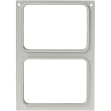 The cassette DF10/20 for CPET trays 510 ml and 670 ml - 2-use by Duni GmbH is a rectangular silver frame with two identical openings and four mounting holes per corner, ideal for the catering industry. Pictured here against a white background.