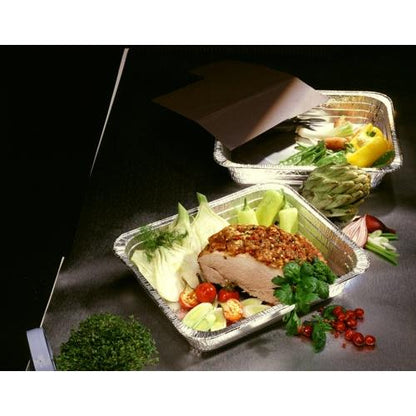 Three Starpak Gastronorm containers (Alu, 3.4L, 5x26.2x32.2cm) present various fresh vegetables, herbs, cooked meat with herbs, tomatoes, and lemon slices. Bright green adorns the table against a dark background.