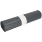 Pictured is a roll of EMIL DEISS KG (GmbH + Co.) DEISS trash bags 575x1000x0.07 mm made from recycled LDPE 70 l black, bundled with a white paper band, on a solid white background.