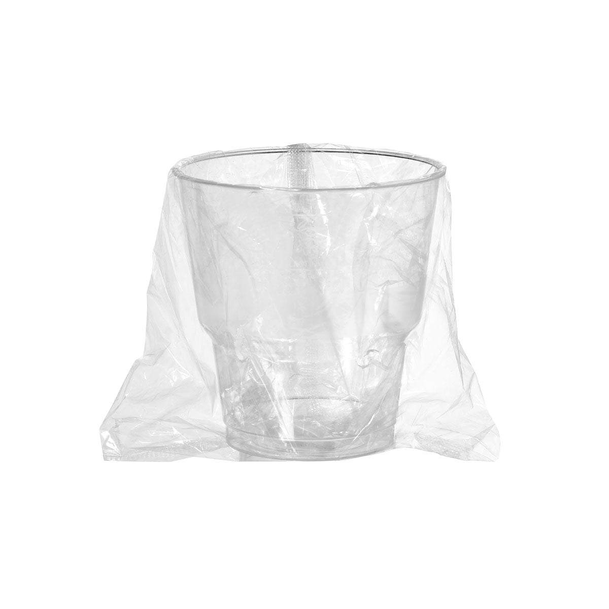 A transparent toothbrush glass from Duni GmbH (PS, individually wrapped for hygiene) sits centrally on a white background with a clear plastic bag - ideal for stylish organization in the bathroom.
