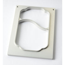 A rectangular cassette DF10/20 for PP trays, 700/400 ml, 2-compartment by Duni GmbH, with two irregularly shaped cutouts and a thin metal bridge, lies on a white surface.