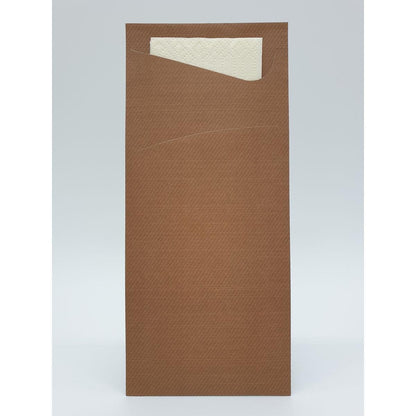 A brown paper envelope (190 x 85 mm) from Duni GmbH, whose top corner is slightly open, reveals a white Sacchetto tissue napkin inside against a plain light gray background, highlighting this practical accessory.