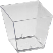 The Duni GmbH Square Transparent PS Box (47x47x45 mm) is depicted at an angle on a white background, ideal for storing and presenting jewelry. The package contains 100 pieces.