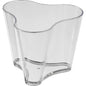 The Organic Puzzle Transparent 53x53x45 mm by Duni GmbH is a clear PS toy with wavy edges and three rounded corners, reminiscent of an organic puzzle piece. Pictured is a pack of 100 pieces against a simple white background.