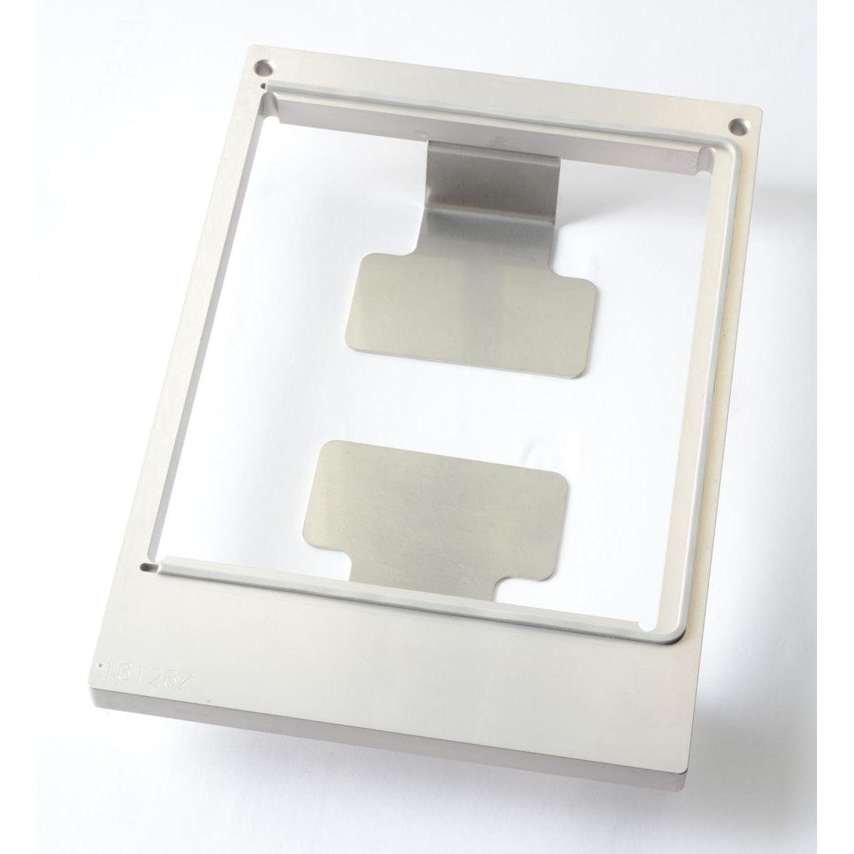 The Duni GmbH cassette DF10/20 for cardboard box is a rectangular metal frame (1200 ml, L) with two flat plates inside and small corner holes, perfect for compact storage, depicted on a white background.