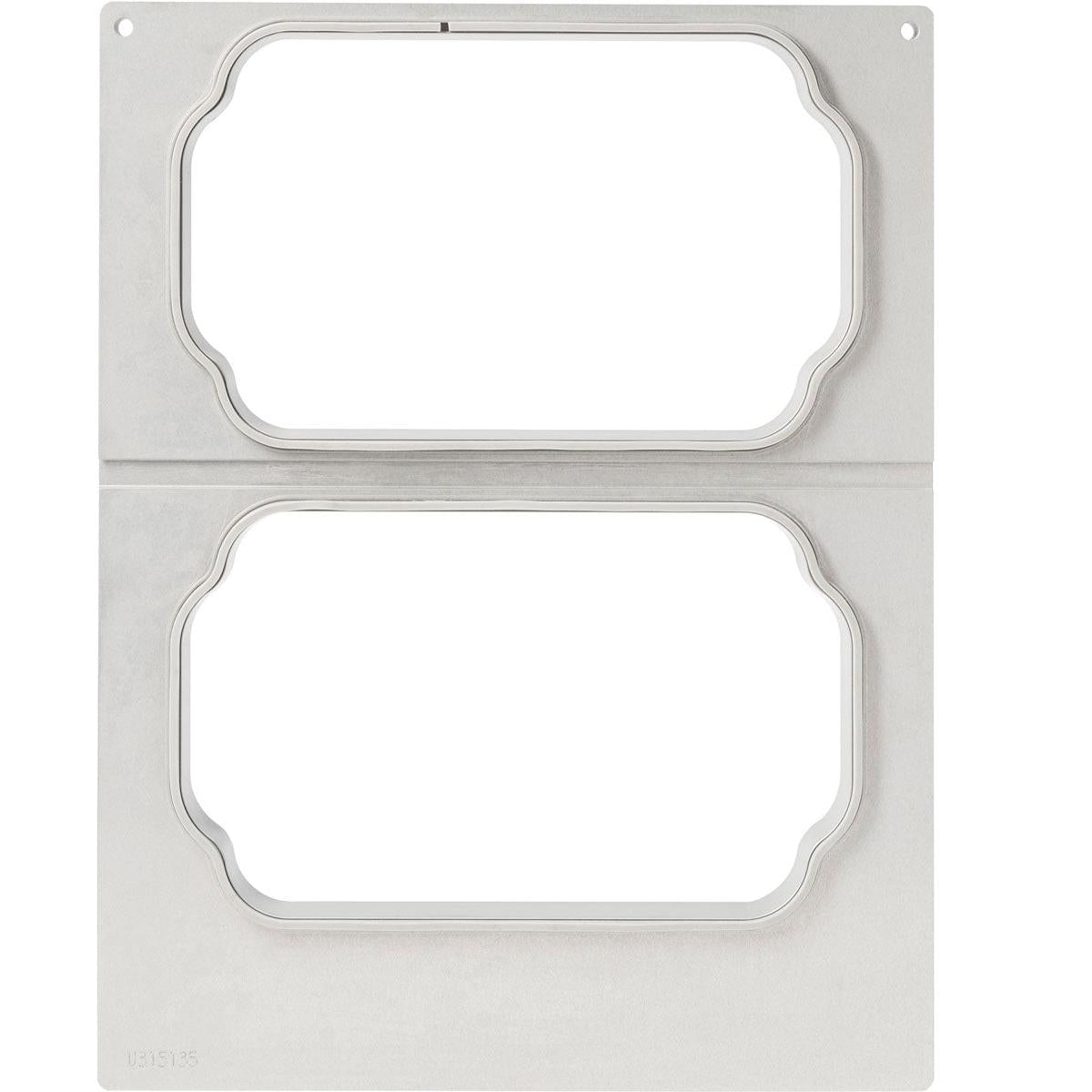 A flat metal stencil with two ornate cutouts, perfect for safe storage in the DF15/25 cassette for PP shell Take Away by Duni GmbH. The brushed surface features a small engraved number in the lower left corner.