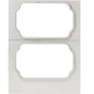 A flat metal stencil with two ornate cutouts, perfect for safe storage in the DF15/25 cassette for PP shell Take Away by Duni GmbH. The brushed surface features a small engraved number in the lower left corner.
