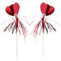 The decoration pick PAPSTAR 100 from PAPSTAR GmbH features two red heart picks with metallic streamers – ideal for stylish presentations or buffets, here on a white background.