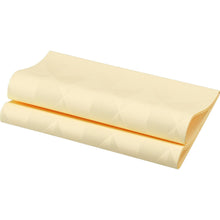 The folded Elegance napkins 40x40 cm in Crystal Cream by Duni GmbH, made of light yellow textured paper with a subtle geometric pattern, are depicted on a white background. The package contains 40 high-quality napkins for the elegantly set table.