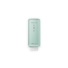 A mint green, wall-mounted CWS PureLine front panel for the Disinfect Foam/NT dispenser shows "DISINFECT SOAP", illustrated instructions, and a sleek design against a white background.