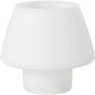 The modern, matte white table lamp reflects the minimalist elegance of the Duni GmbH tealight holder Moody Maxi, silicone, white - both are characterized by clear lines and simplicity without visible switches or decorations.
