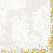 White floral and leaf patterns on light beige, with a golden glitter border on two edges. The 33x33 cm, 3-ply (50-pack) napkins from Duni GmbH are designed in a vintage style with lace and the "Duni" logo in the bottom right corner.
