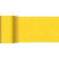 A roll of Dunicel table runner 20 m x 15 cm from Duni GmbH in yellow with a subtle grid-like structure and matte finish is partially unrolled on a white surface. Ideal for table decorations with delicate, intersecting lines.