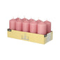 A pack of ten pink Starpak 10 pillar candles (Ø 40 mm · 90 mm) is arranged in two rows in an open yellow Starpak box with the inscription "10" – ideal for weddings or a cozy atmosphere.