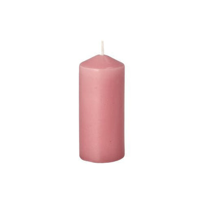 A pink pillar candle from Starpak with 10 pillar candles, Ø 40 mm · 90 mm, with a rounded tip and a single white wick stands upright on a white background, ideal for weddings or creating a cozy atmosphere at home.