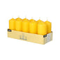 The Starpak 10 pillar candles Ø 40 mm · 90 mm are arranged in two rows in a beige cardboard box with side labels and create a romantic atmosphere thanks to their long burning time and visible wick.