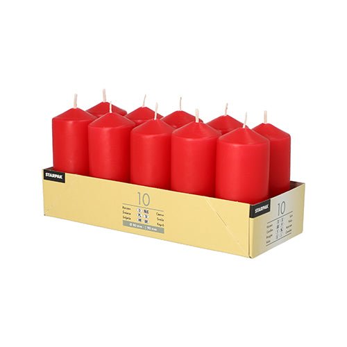 A cardboard tray holds 10 upright Starpak pillar candles Ø 40 mm · 90 mm in two rows of five each, each with a white wick. The tray displays the Starpak branding and product information – ideal for a romantic atmosphere against a white background.