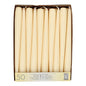 A box labeled "Starpak 50 taper candles Ø 2.2 cm - 25 cm" contains 50 upright white candles in two rows. The front of the box features multilingual text and the number 50.