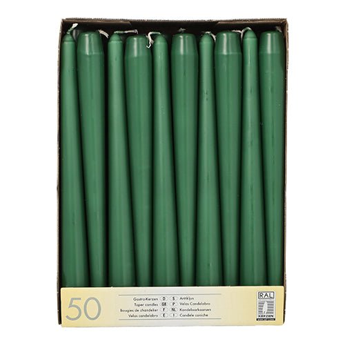The Starpak 50 taper candles (Ø 2.2 cm, 25 cm) are uniformly shaped, carefully packed in rows, with long burning time; the label at the bottom provides quantity and product info.