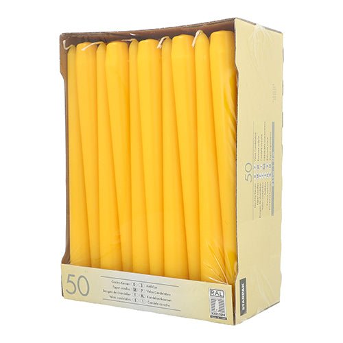 A cardboard box with 50 Starpak taper candles (Ø 2.2 cm, 25 cm), each standing upright and wrapped in clear plastic, displays quantity, product information, and their long burn time on the front and sides of the packaging.