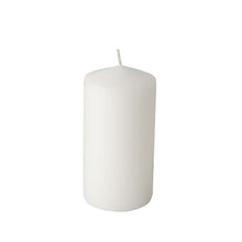 The Starpak 6 pillar candles (Ø 60 mm, 115 mm) stand out for their long burn time and simple design. The white candles are shown standing upright with a wick against a white background.