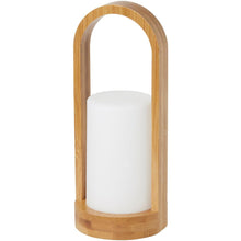 The LED candle holder made of bamboo from Duni GmbH (240x100 mm) serves as a stylish decoration with a round base and curved handle for modern accents in your room. The package contains 1 piece.