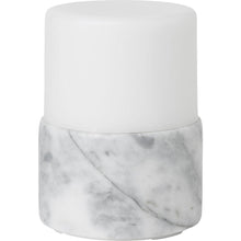 The LED candle holder Stone by Duni GmbH (105x75 mm, 1 piece) with a white-marble design and matte lid adds a stylish accent to any table and provides bright light for your decoration.