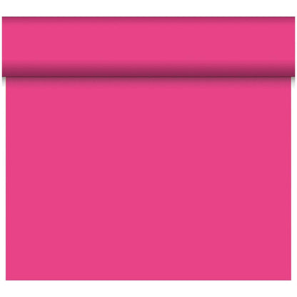 A partially unrolled Dunicel “Tête-à-Tête” table runner (24 m x 0.4 m, 20 sections) from Duni GmbH in bright pink casts a shadow along its top edge; its smooth surface is perfect for an elegant table setting.